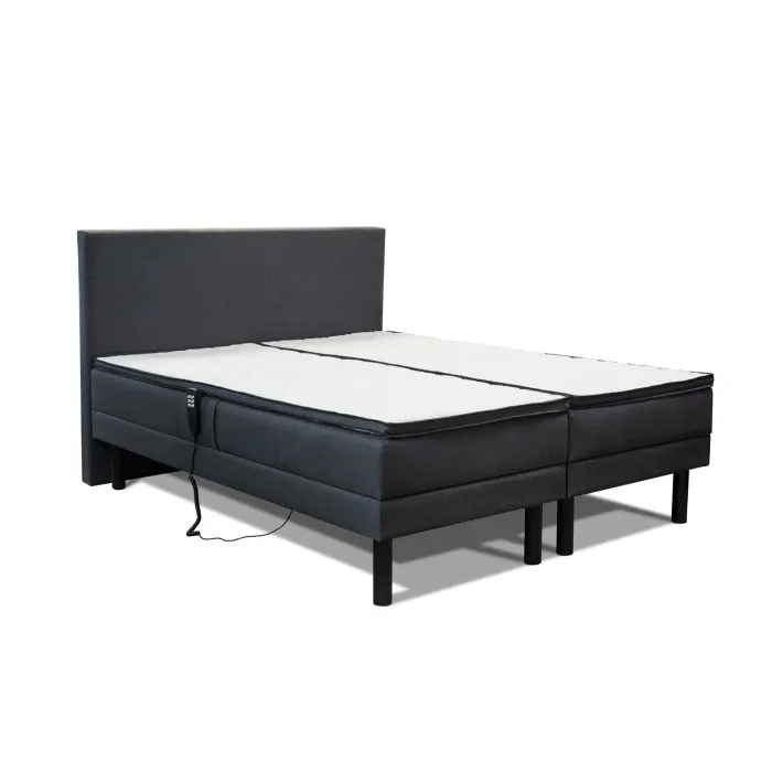 Electrically adjustable continental bed with a remote control